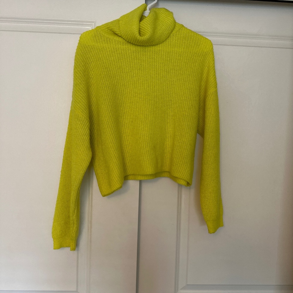 Bright yellow sweater
